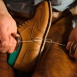 shoemaker-workshop-making-shoes_171337-12252